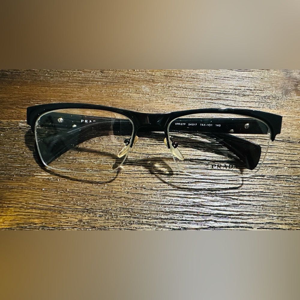 Prada Sleek Black Frame VPR67P 7AX1O1 54 140